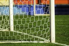 Afbeelding van Freeimages.com (http://www.freeimages.com/photo/goal-net-1-1440749) Close-up van een voetbaldoel
